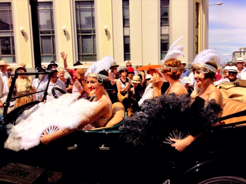 Gatsby glamour girls add some glitz to the Automobilia parade.